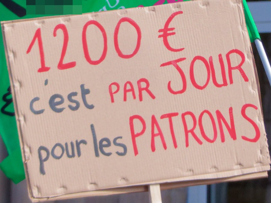Pancarte « 1200 € c'est PAR JOUR pour les PATRONS », Belfort (90), 15 mars 2023